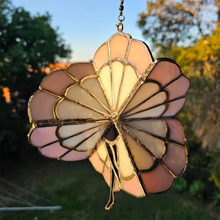 Roterende hengemaskin for farget glass