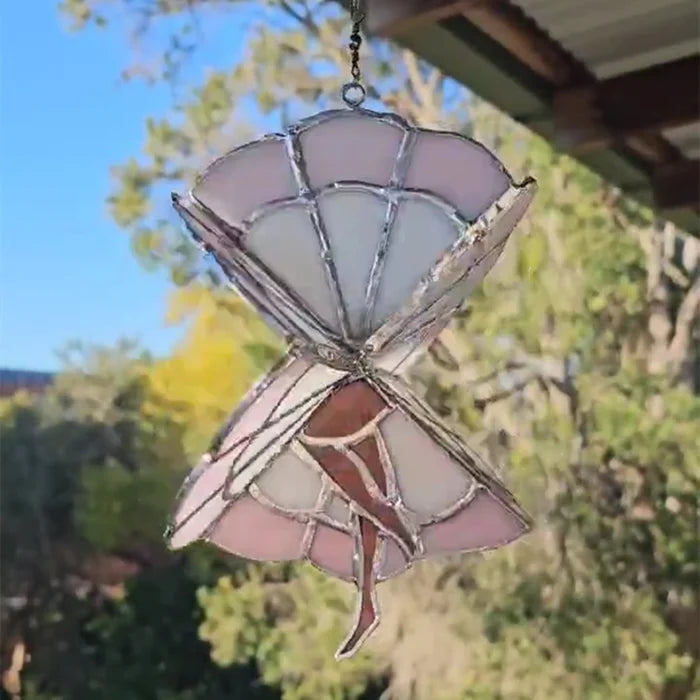 Roterende hengemaskin for farget glass